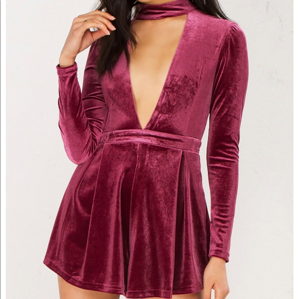 Long Sleeve Akira Romper. Worn once!